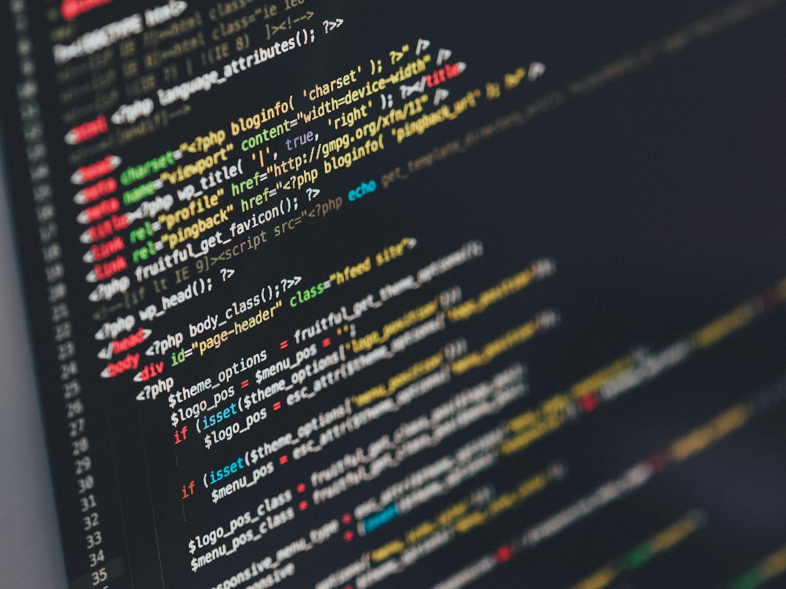 Close-up of HTML and PHP code on a computer monitor
